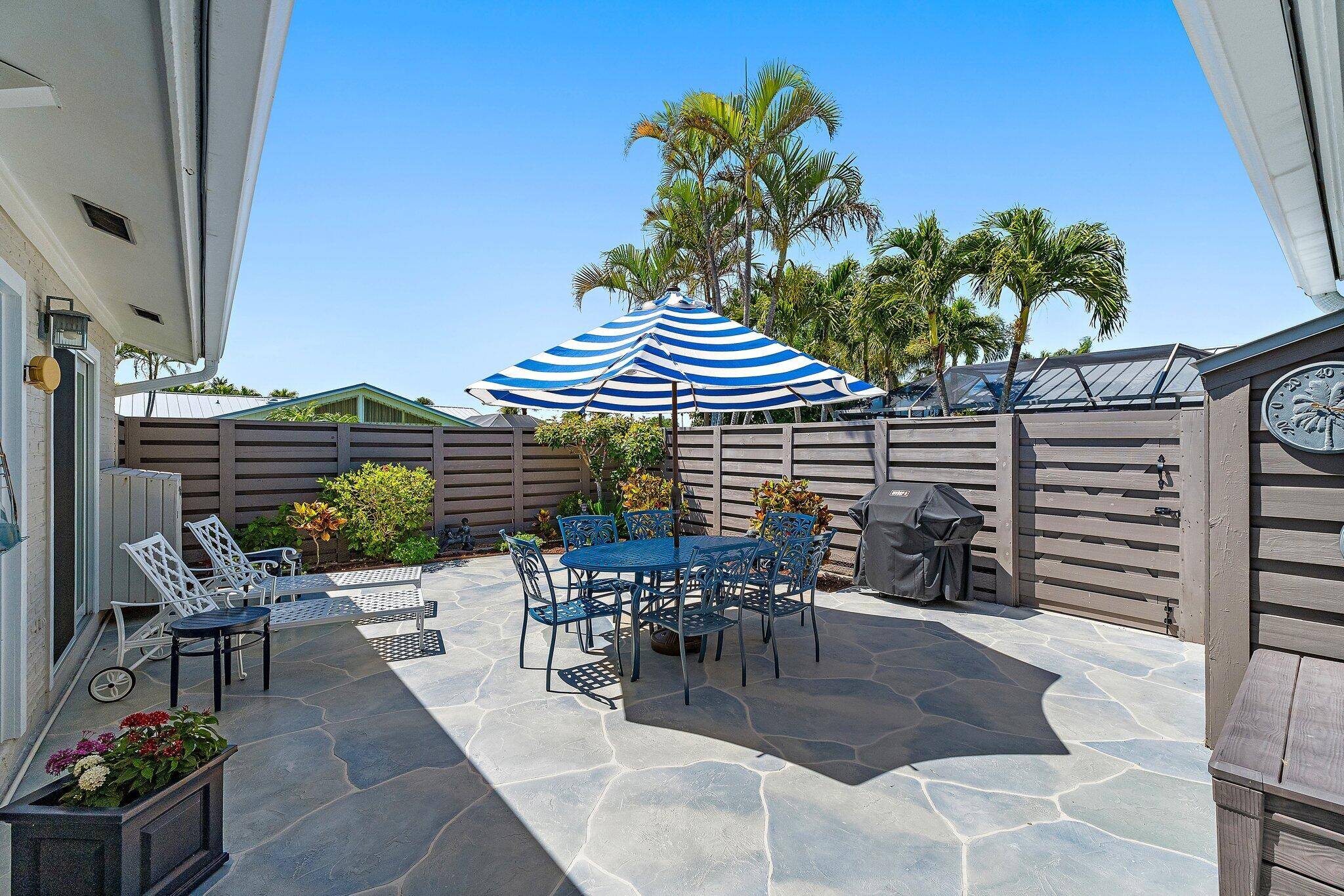 Sun kissed renovated villa, meticulously maintained located in a prime location within Oceanside Terrace.