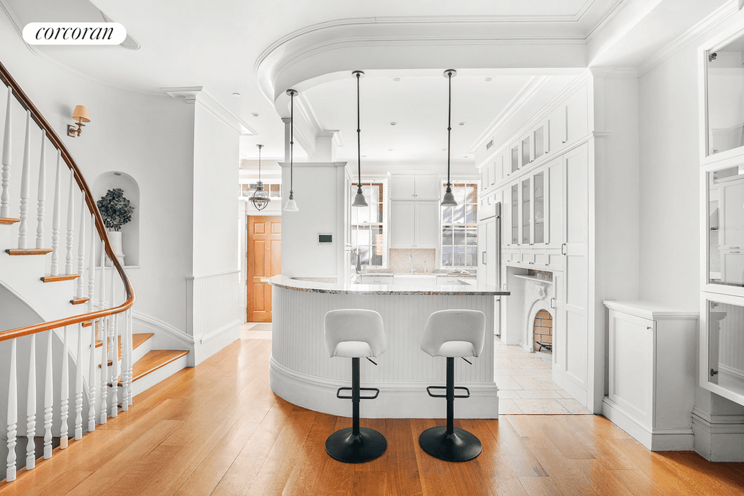 65 Bedford Street is a charming Greek Revival townhouse located on a historic landmarked West Village block.