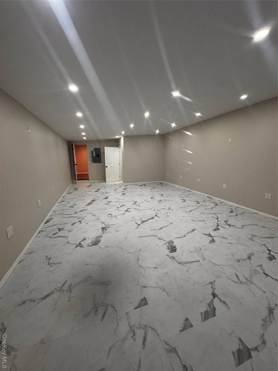 Step into a bright, contemporary commercial space that blends style and functionality in the heart of Lindenhurst Village.