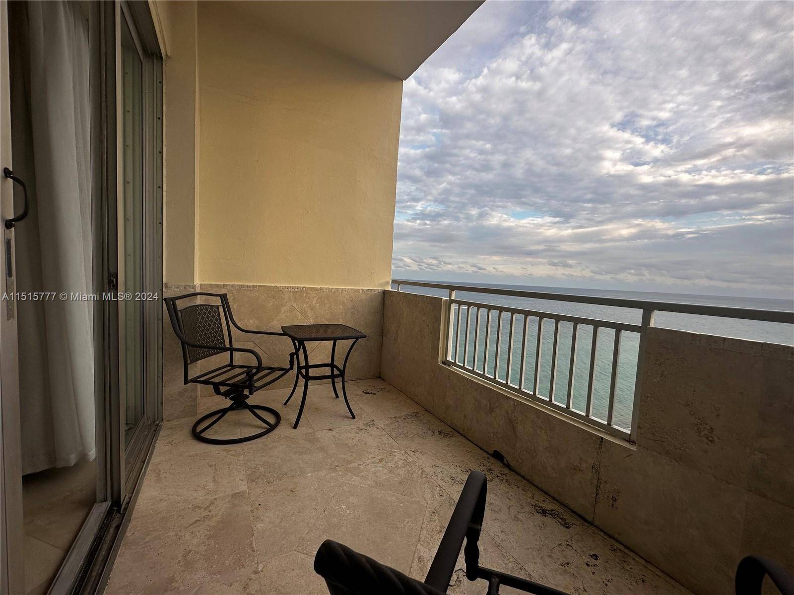 Stunning penthouse unit with direct ocean and city views from each room in the oceanfront building available for immediate occupancy.
