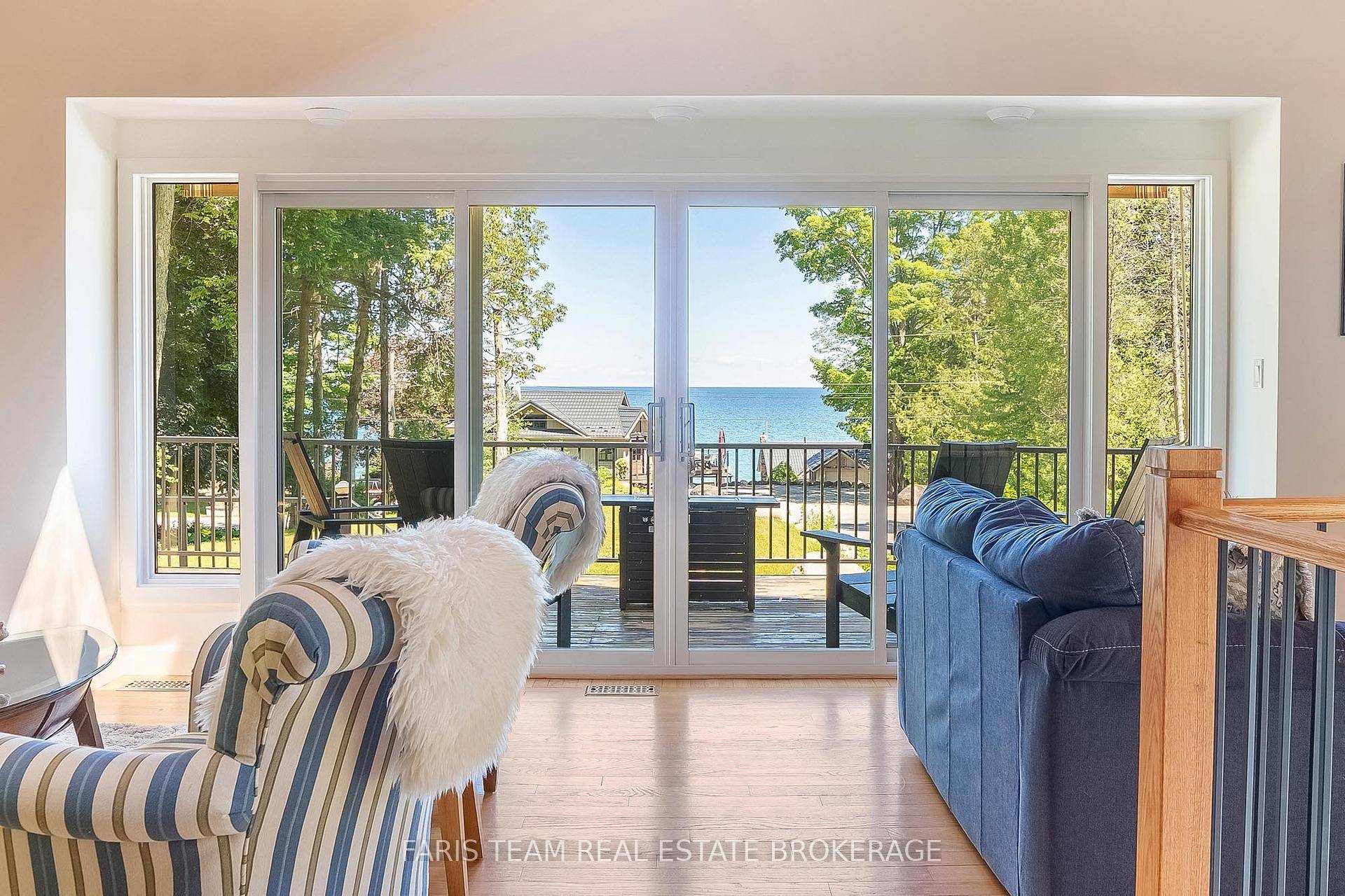 Top 5 Reasons You Will Love This Home 1 Almost waterfront, bask in unique full water views of Georgian Bay from the main living areas and deck, providing a serene ...