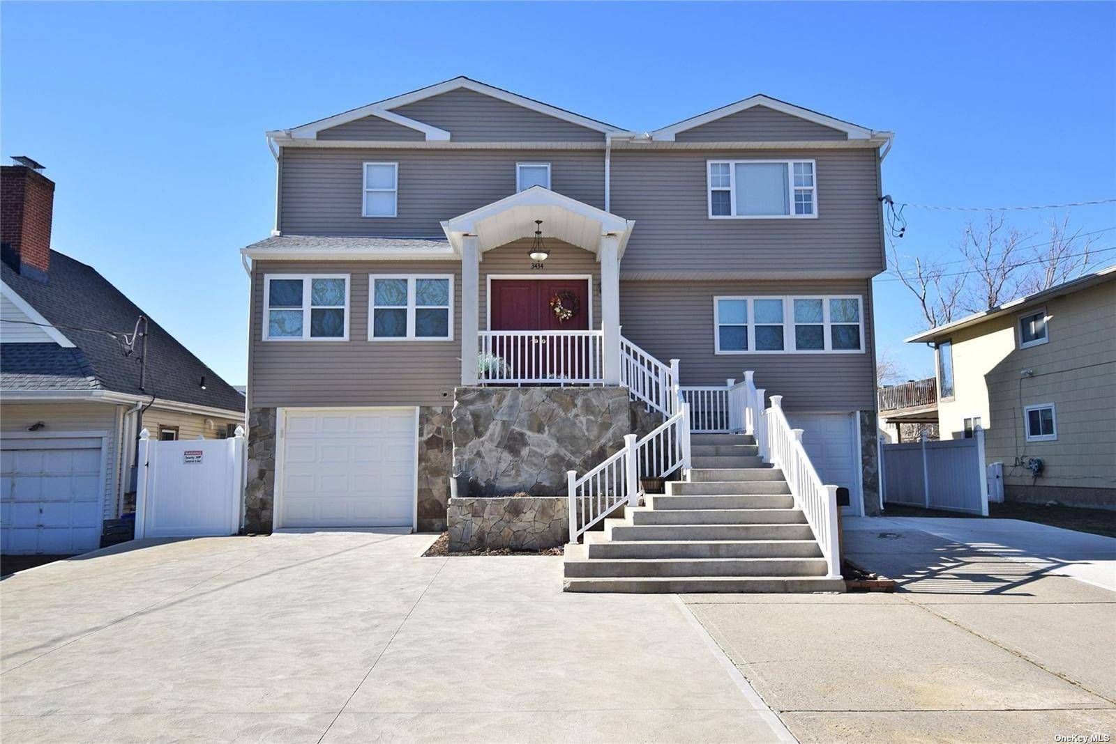 Mother daughter. Welcome to your three level home with an open floor concept overlooking the water.
