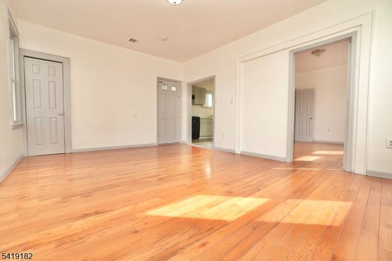 Prime corner 2 family in Newark featuring 6 bedrooms, 2 full baths, and off street parking.