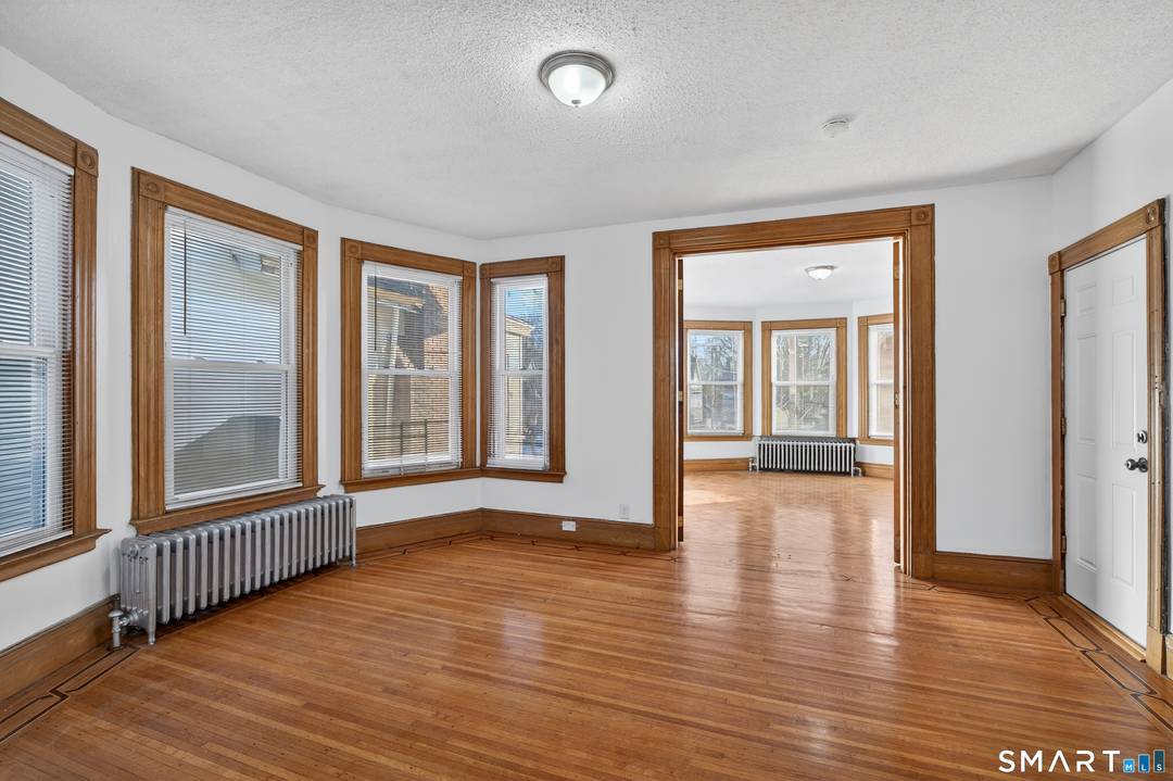 Incredible 3, 792 sq ft three family in New Haven's Edgewood neighborhood, ideal for an owner occupant or investor.