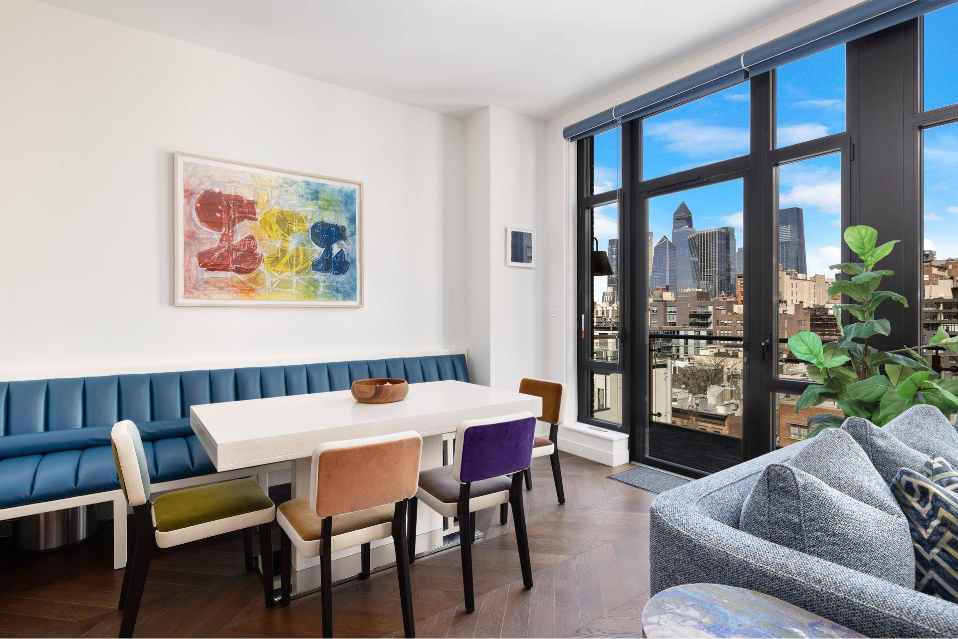 This 1402 square foot two bedroom, two bath plus powder room is bathed in northern light from dramatic oversized divided light windows.