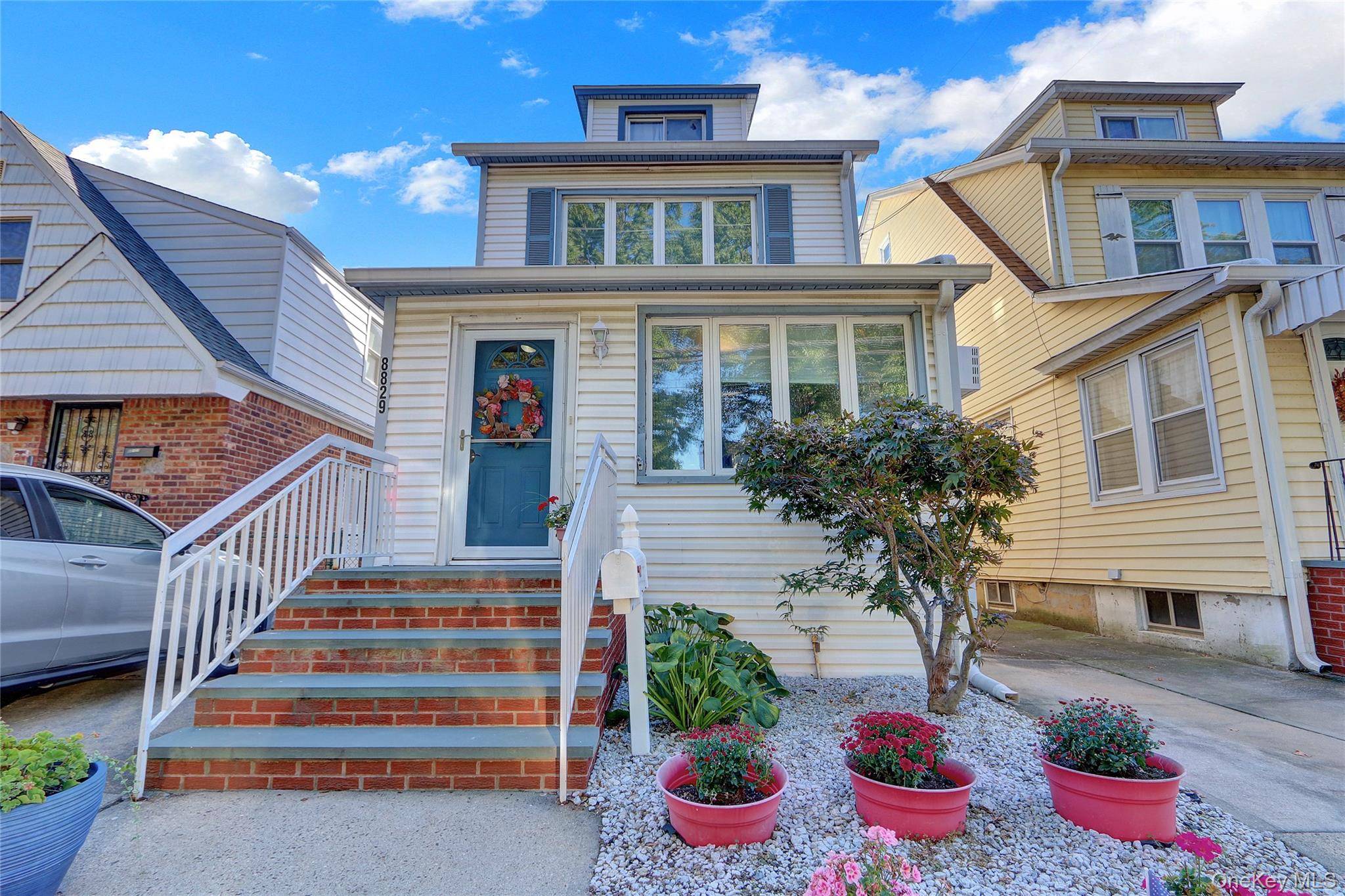 Updated Colonial located in the desirable Queens Village.