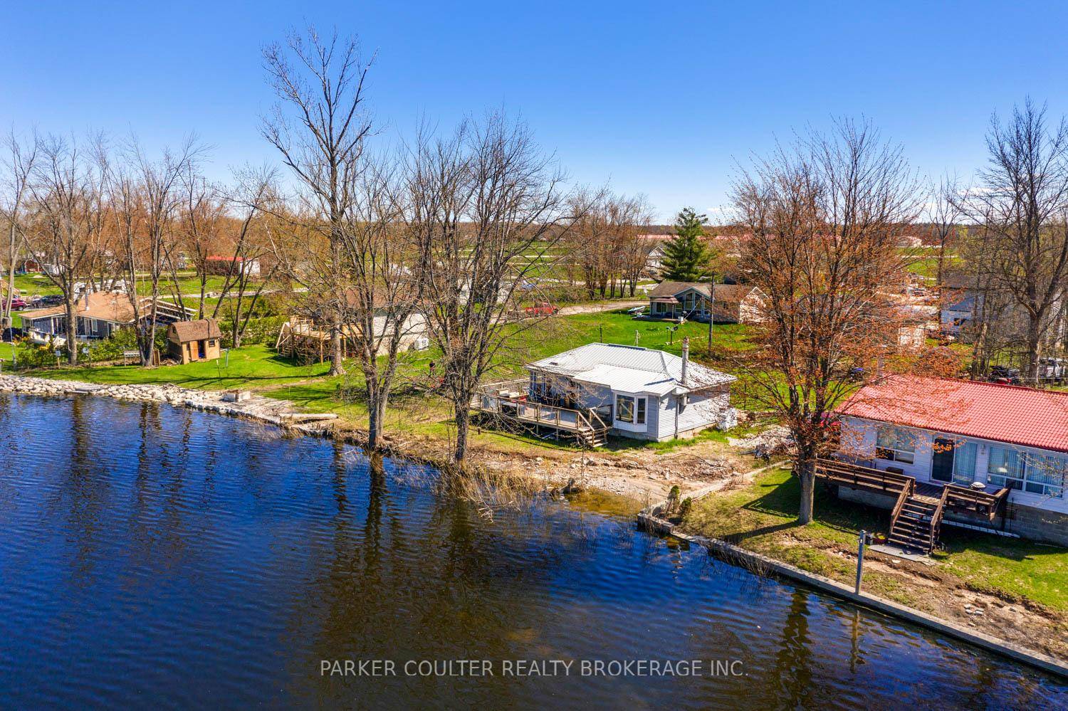 Delightful, fully winterized home, cottage, or investment property right on the shores of beautiful Lake St.