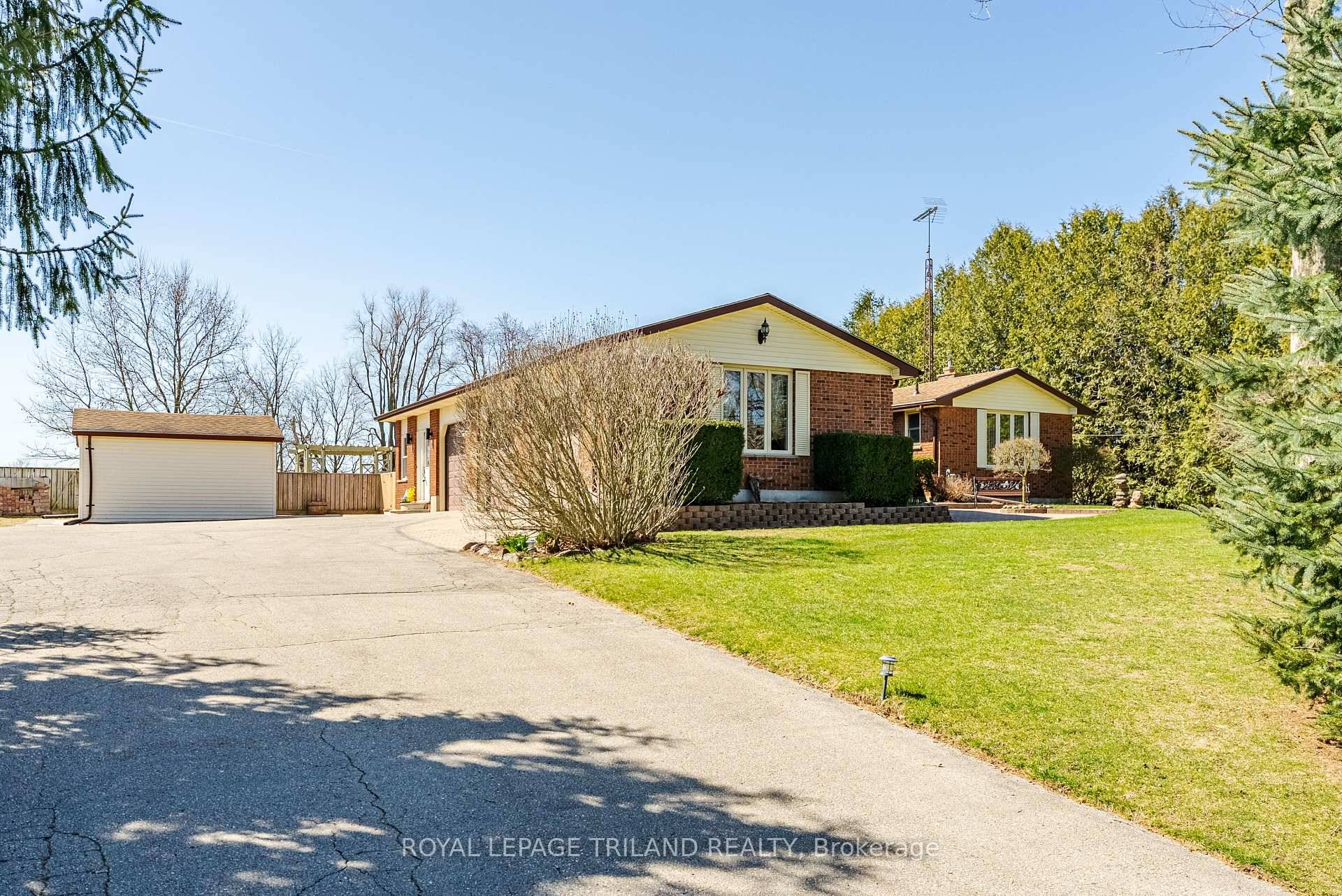 Welcome to 43845 Sparta Line, a spacious and versatile brick ranch style home nestled just west of the historic village of Sparta.
