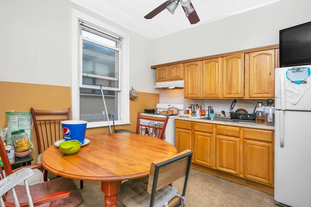 Discover a fantastic investment opportunity with this large four family brick building in the heart of Glendale.