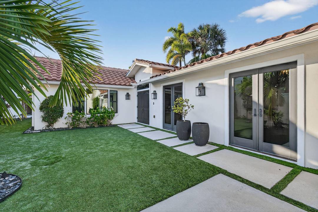 Experience refined coastal living in this stunning custom re built beach compound.