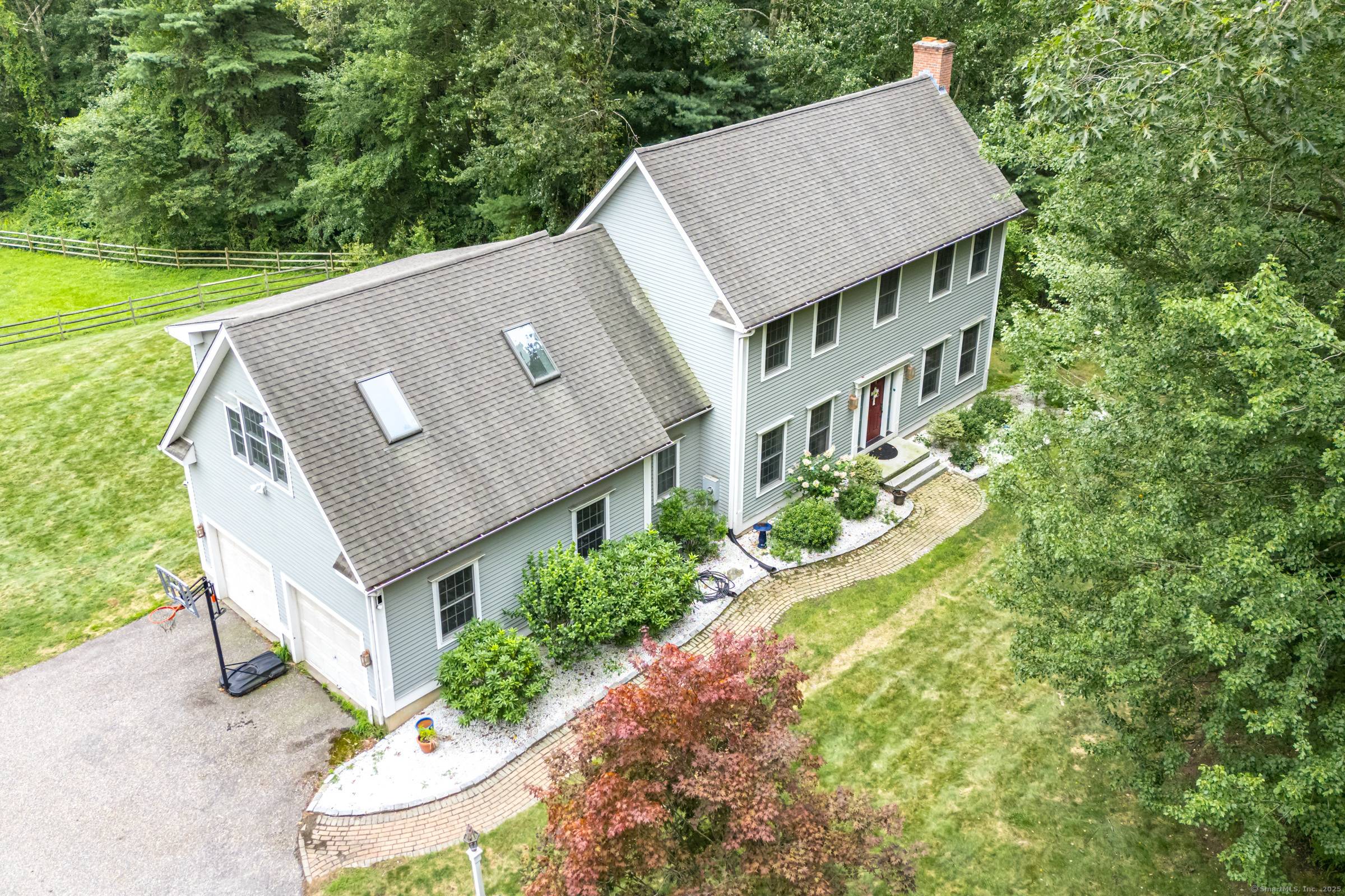 24 Bonair Hill Road in Tolland is a rare find, offering both comfort and functionality for those seeking a blend of country living and modern convenience.