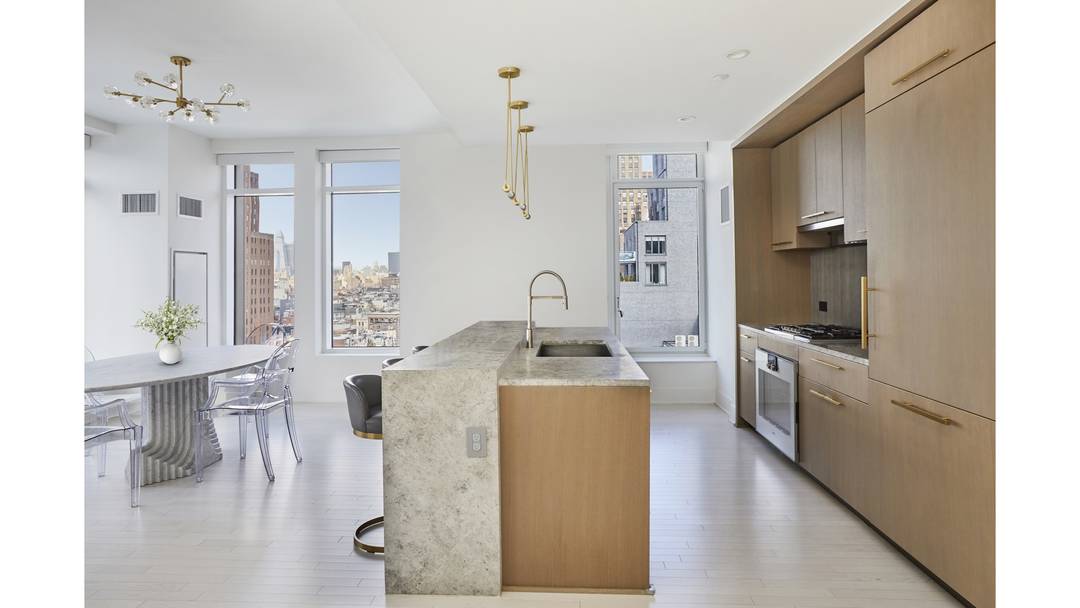 Welcome to this wonderfully bright and gracious high floor corner 3 bedroom, 3 bathroom residence with triple exposures, at the white glove 91 Leonard Street condominium.