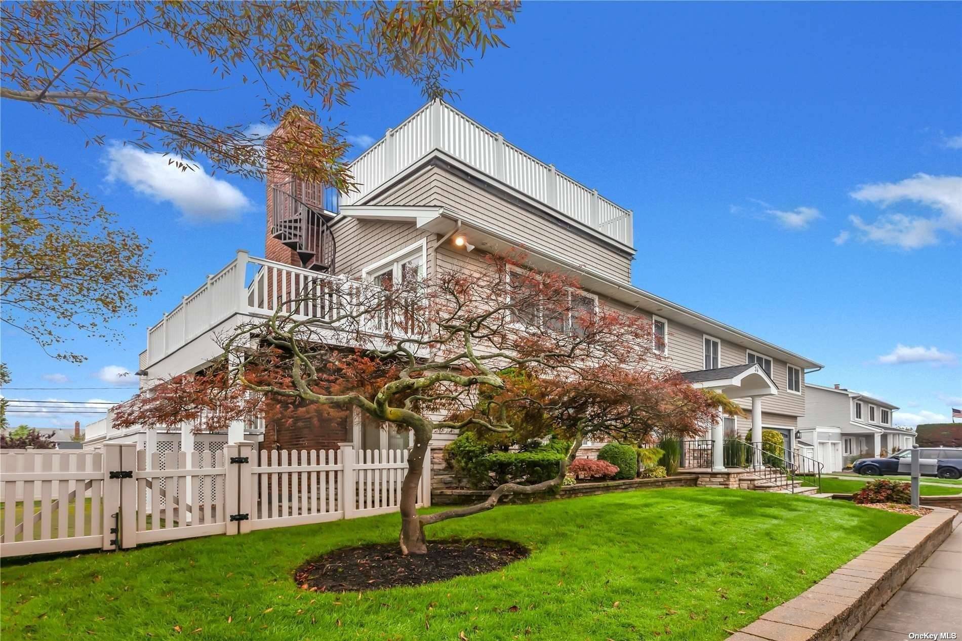 spectacular furnished beach house with ocean and bay views and private beaches four bedroom 4 bath modern design with granite tile and hardwood floors high ceiling custom windows and doors ...