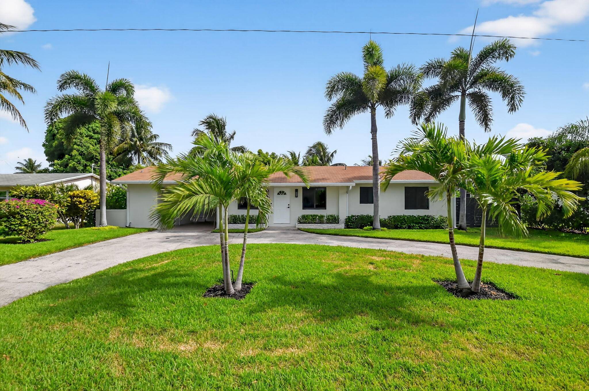 Discover your dream coastal lifestyle in this completely renovated East Boynton Beach gem !