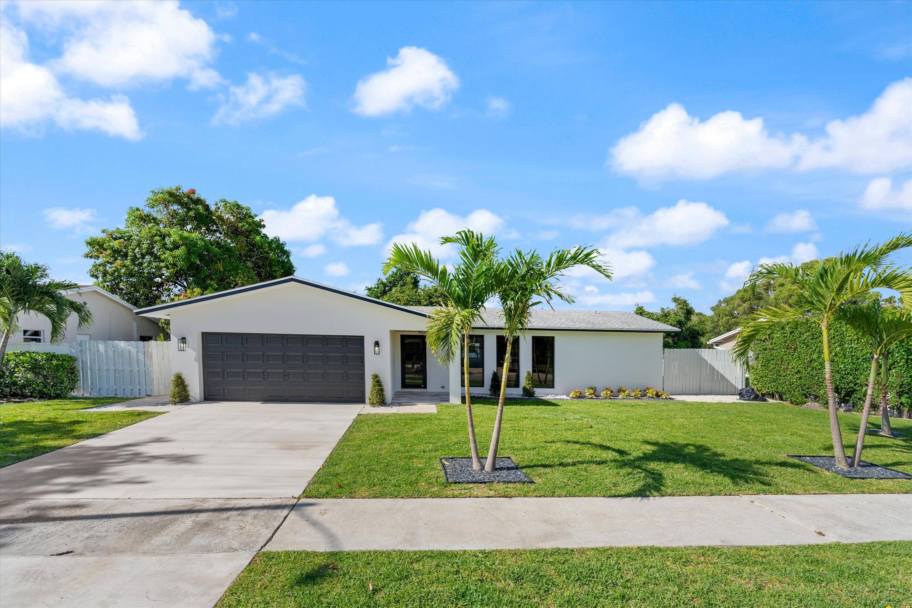 Experience elevated South Florida living in this stunning, completely reimagined 3 bedroom, 2 bathroom home offering 2, 216 total square feet of refined indoor outdoor space in one of Boca ...