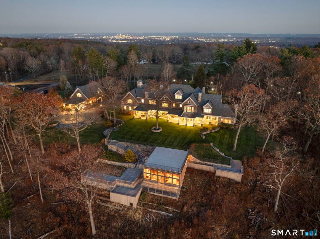 IMAGINE LIVING HERE ! Once upon a time, a modest A frame was perched along Farmington's ridgeline.