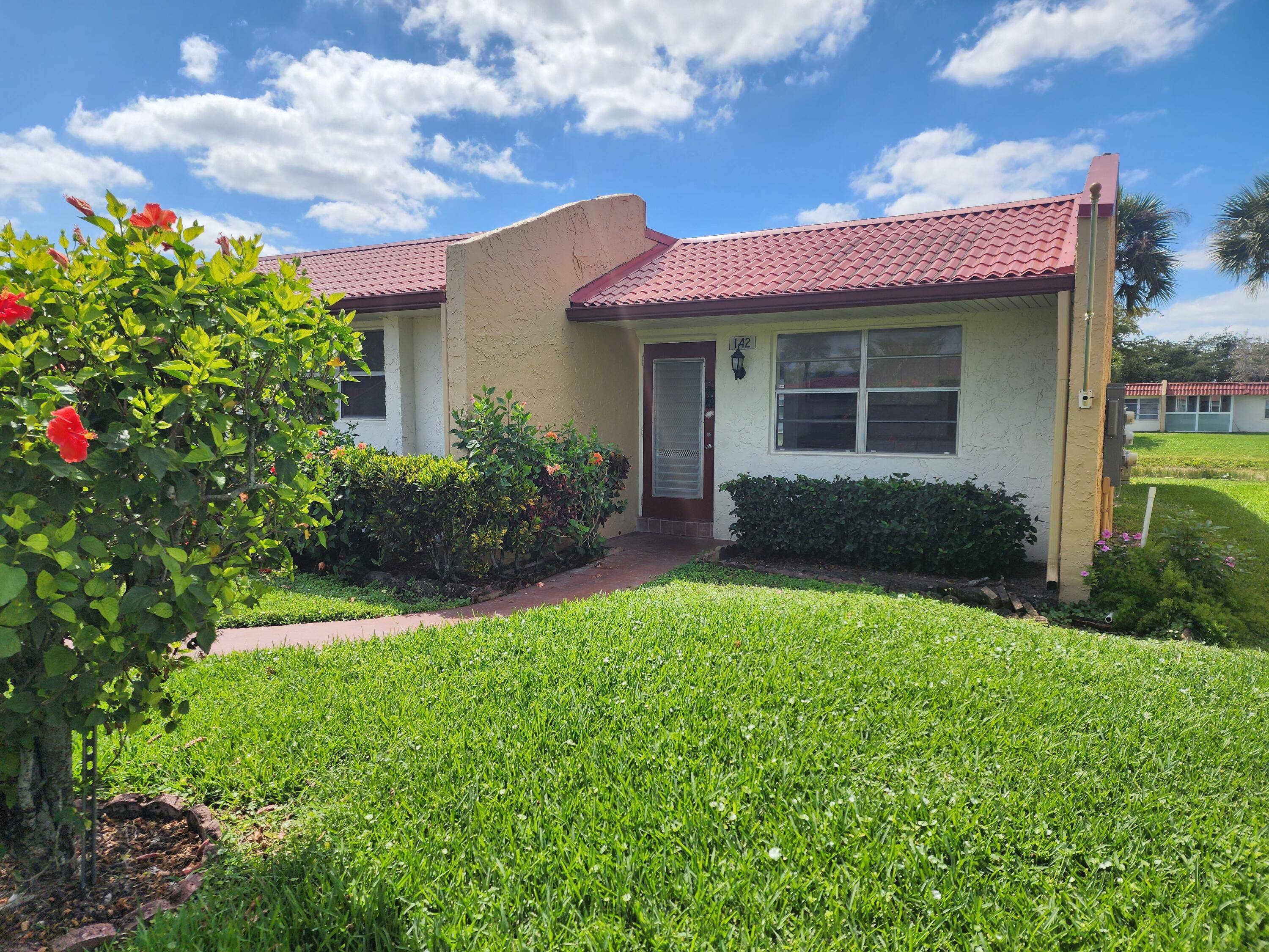 Completely remodeled villa in the desirable Golden Lakes Community !
