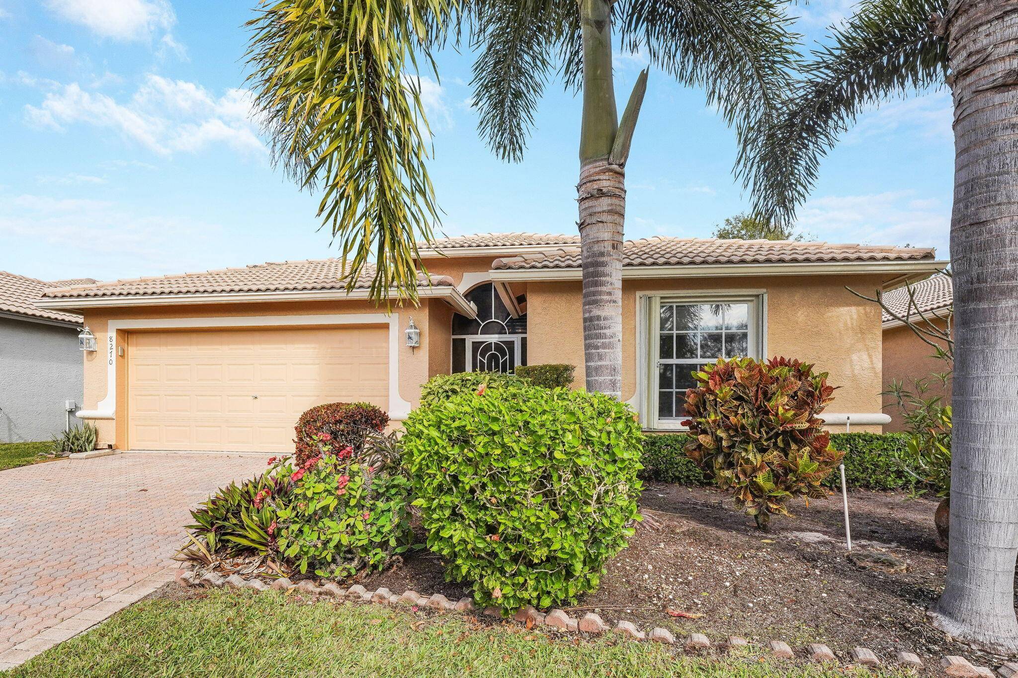 Step into this stunning home that boasts a split floor plan and soaring vaulted ceilings no popcorn texture.