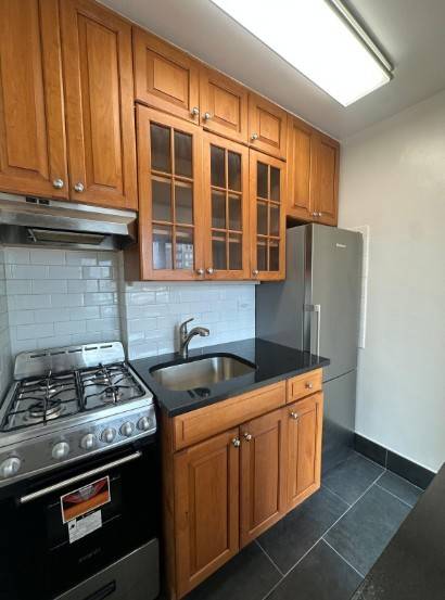 Beautiful alcove studio with large private balcony in a prime Midtown West location near Columbus Circle and Central Park !