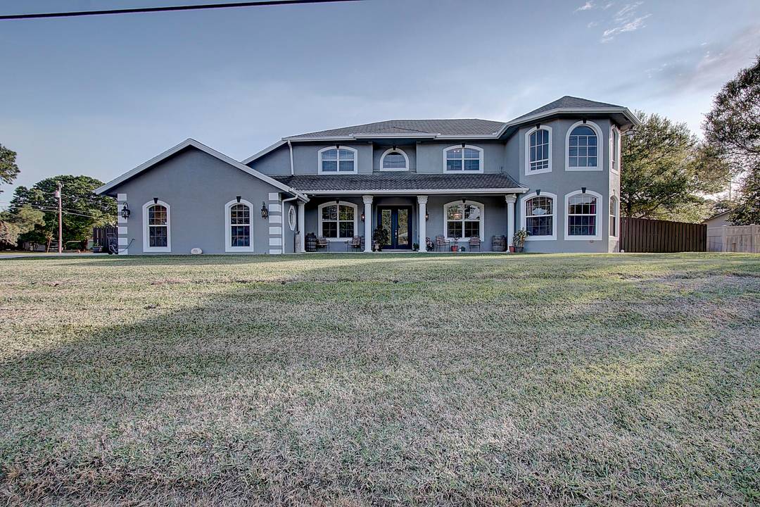 Welcome to this massive two story CBS home located in the desirable Indian River Estates community !