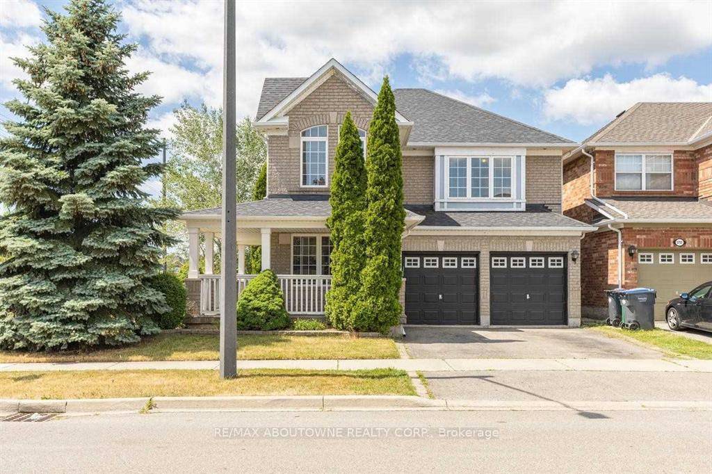 Stunning Detached 4 Bedroom Home with a Charming Wrap Around Porch, Nestled on a Premium Corner Lot !
