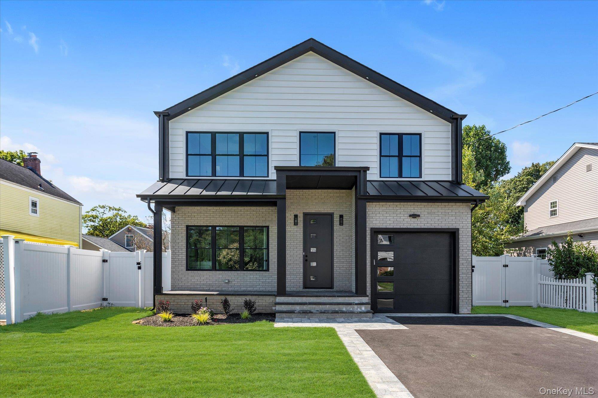 Move In Ready ! Discover this new construction home in desirable North Syosset, offering over 3, 400 square feet of thoughtfully designed living space.