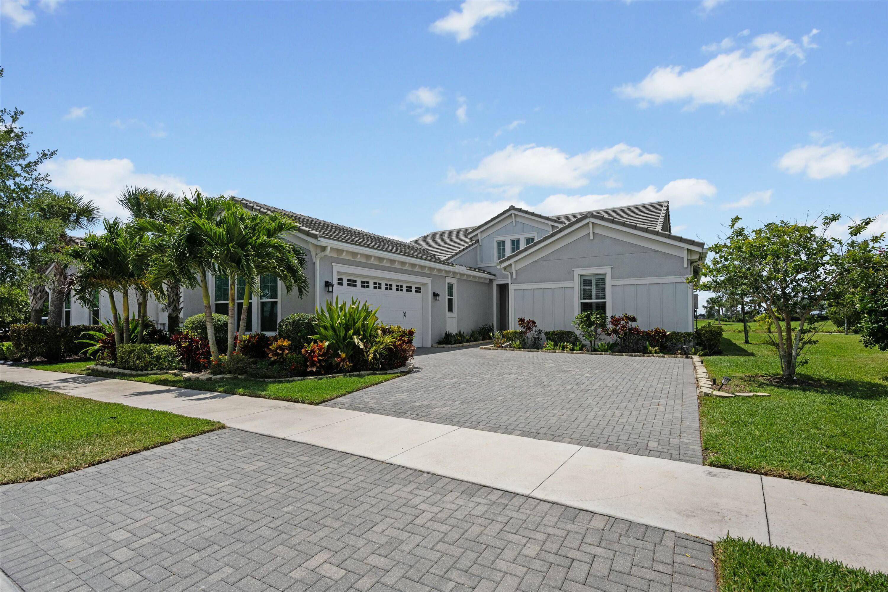Step into elegance with this beautifully upgraded 4 bedroom, 3 bathroom Sandhill model nestled in the highly sought after Hammocks of Westlake.
