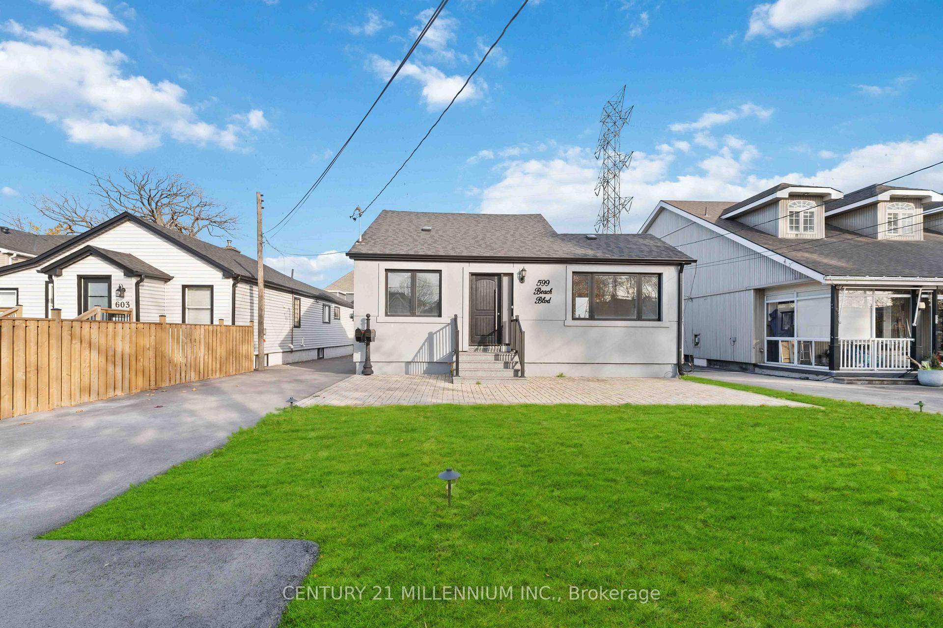 Discover this beautifully updated rarely offered style of home, offering incredible income potential or a spacious multi family home.
