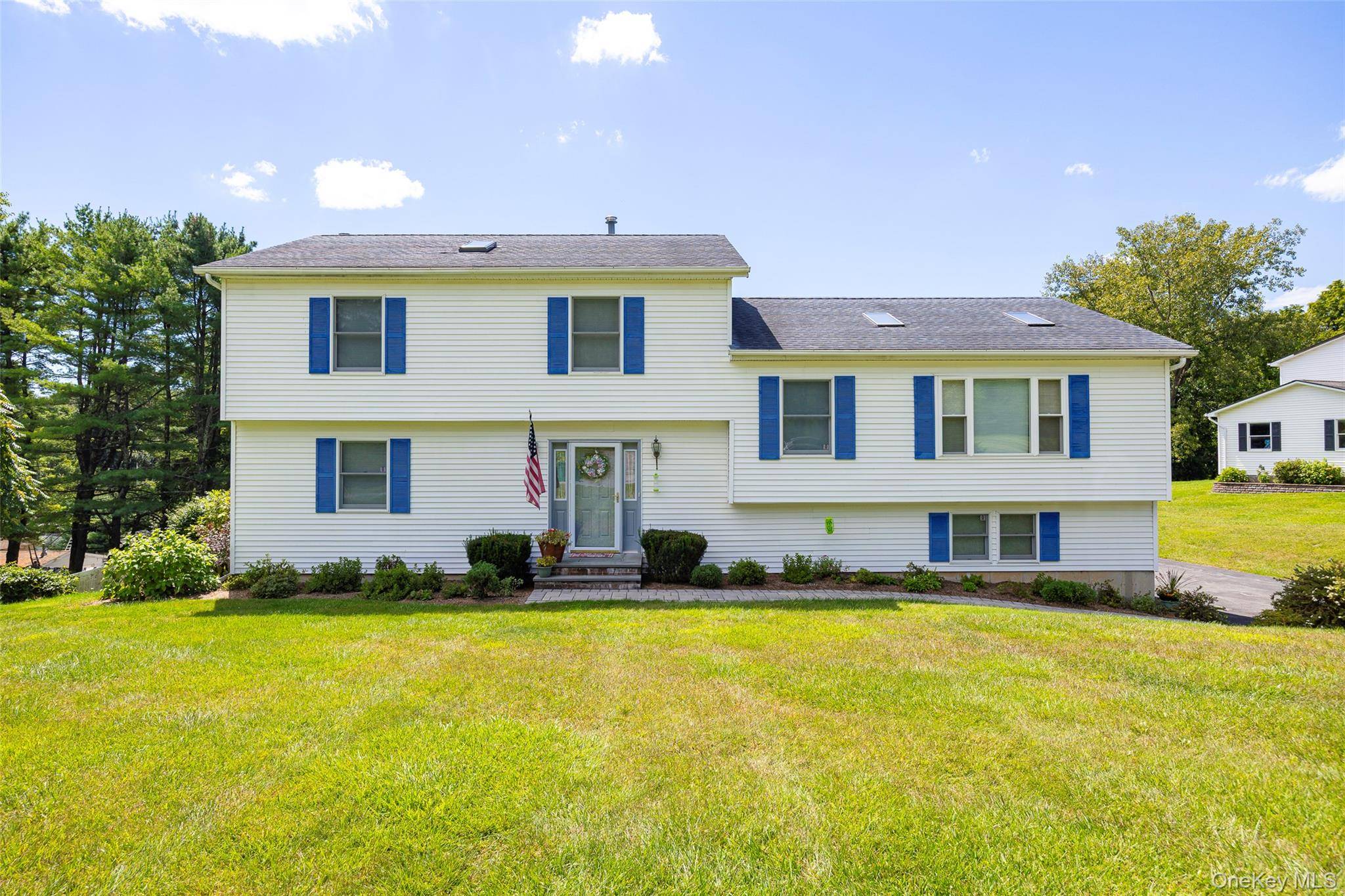 Impeccably maintained 3 bedroom, 3 bathroom split level with attractive and flexible floor plan.