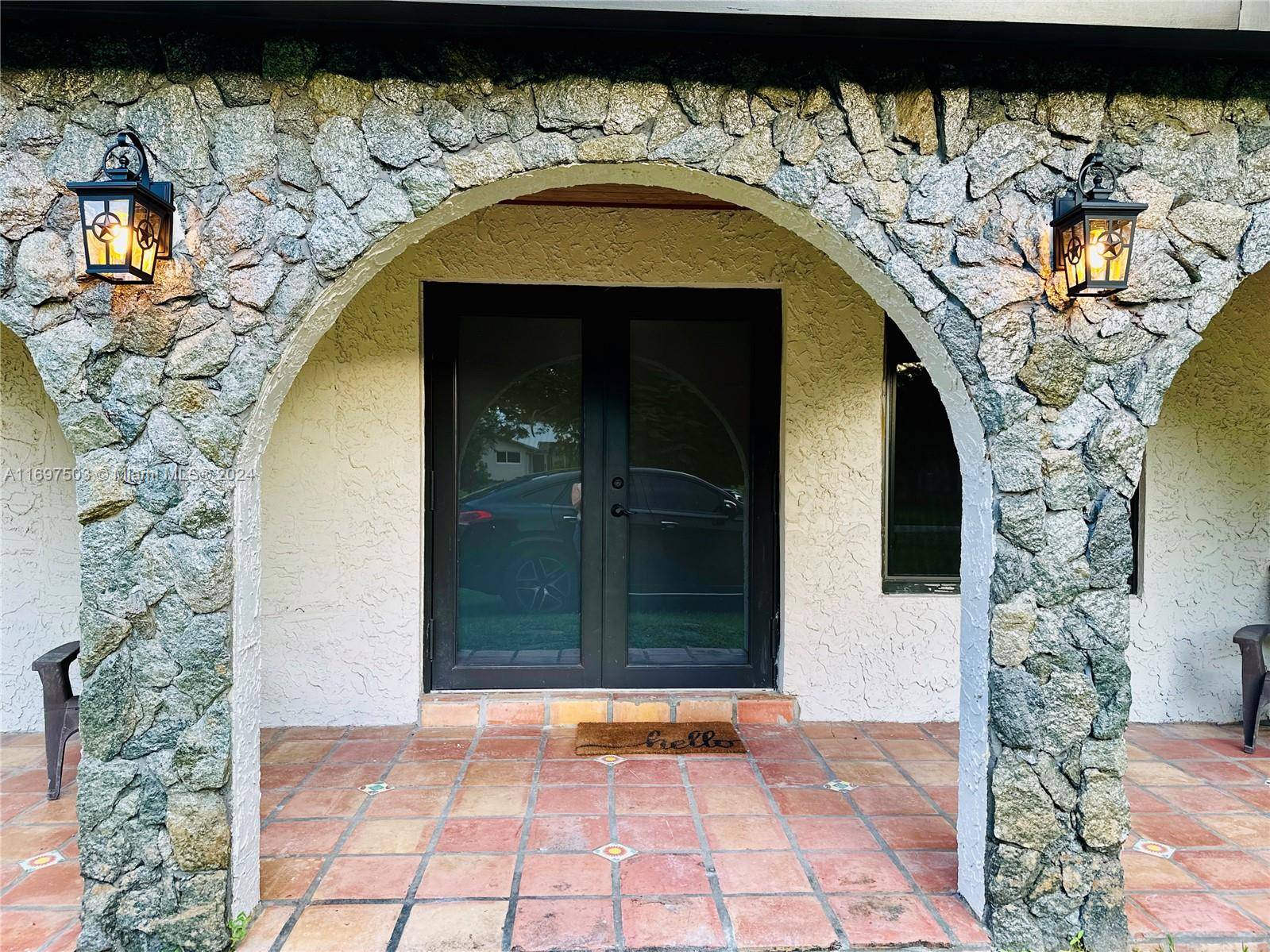 Beautifully remodeled, this 3 bedroom 2 bath home in highly sought after Southwest Ranches sits on over one acre 1.