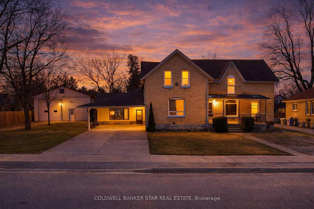 SMALL TOWN DUPLEX WITH DREAM GARAGE Welcome to 179 Main Street in Ailsa Craig, a rare investment property opportunity featuring a solid yellow brick duplex for sale on a large ...