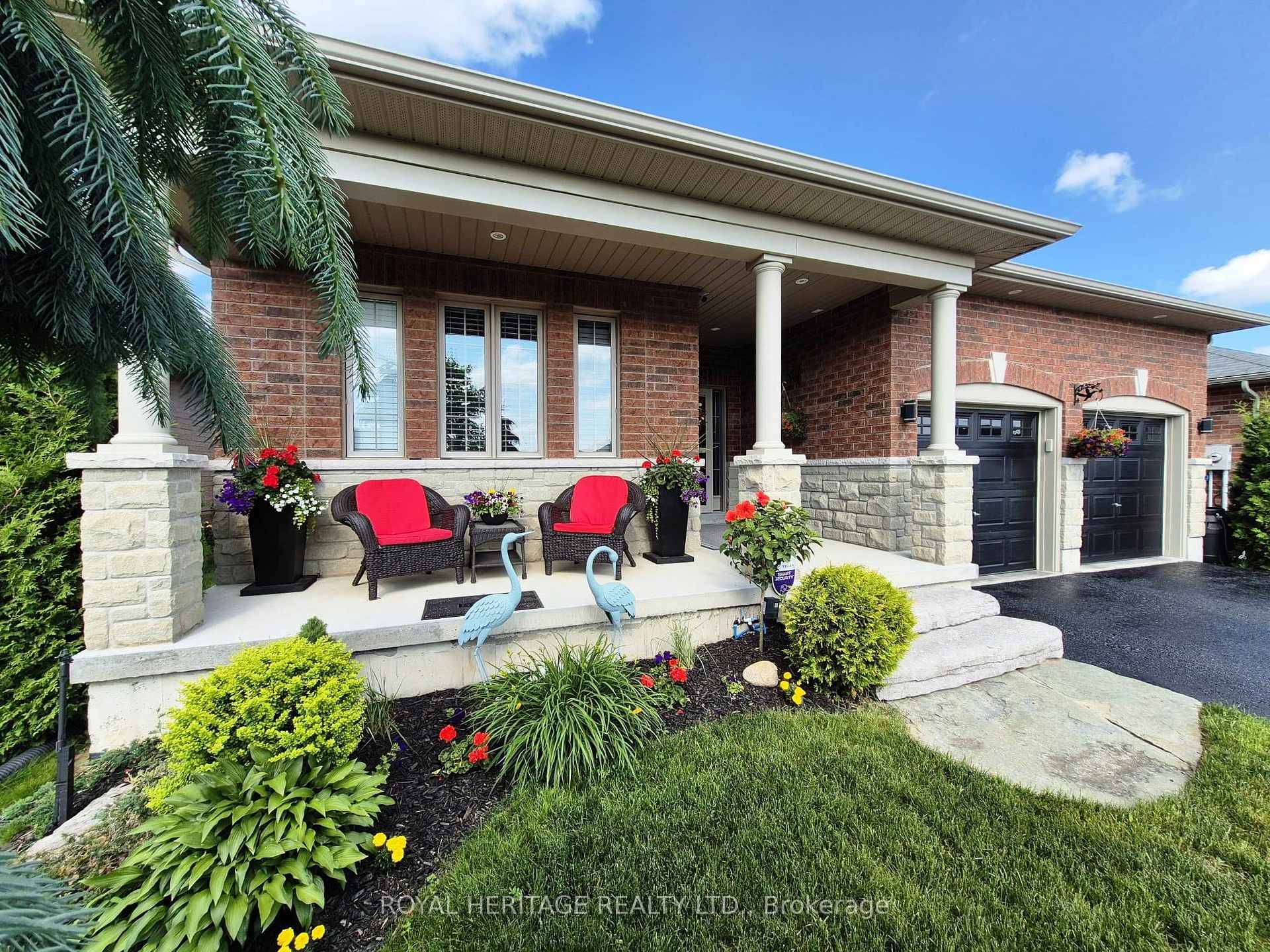 EXTRAORDINARY TURN KEY BUNGALOW ON A BEAUTIFULLY LANDSCAPED LOT WITH LOADS OF STYLE AND MODERN FINSIHES, BACKING ONTO GRASSY PASTURES WITH OPEN VIEWS FROM YOUR DECK OR PATIO.
