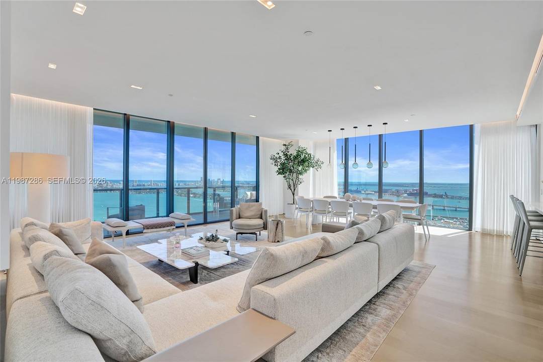 Breathtaking 180 degree views of the open bay, Downtown Miami skyline, and the Atlantic Ocean define this exceptional residence at Elysee Miami.