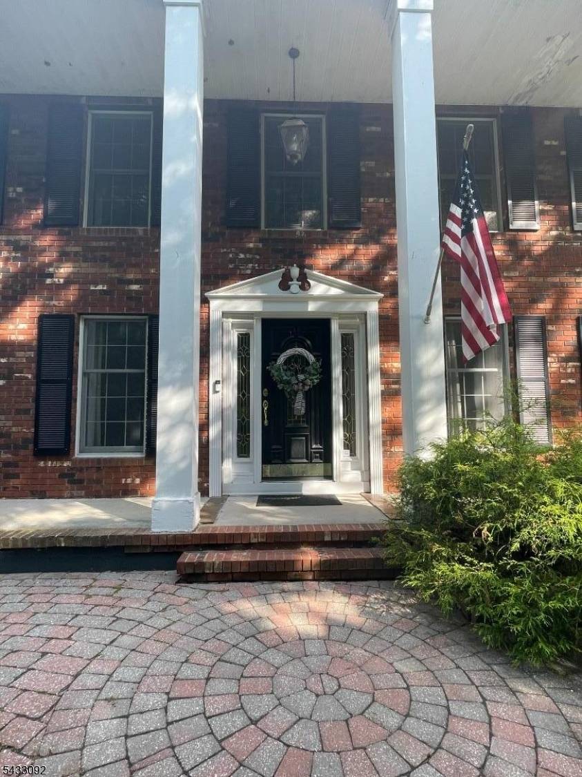 Beautiful Center Hall Colonial in sought after Kensington Wood section of Ringwood.