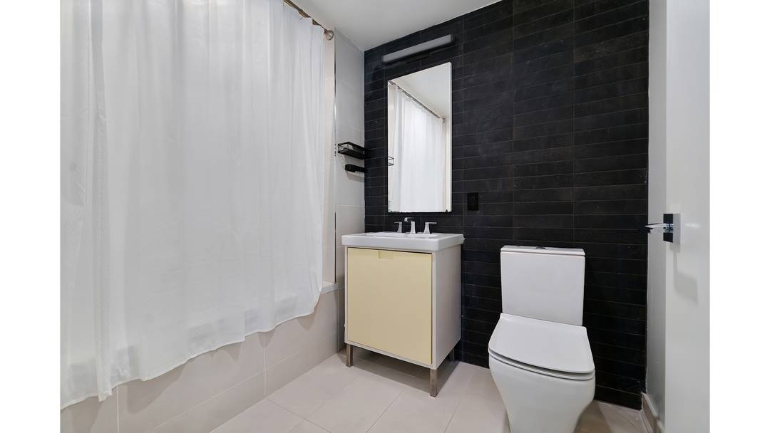 Residence 2B is an oversized, west facing one bedroom home filled with beautiful natural light and open sky views.