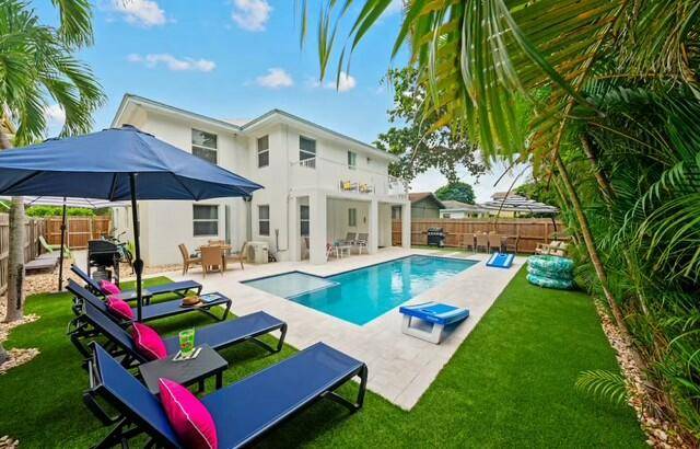 Fully furnished 4 2 upstairs unit of Duplex with shared resort style pool and backyard.