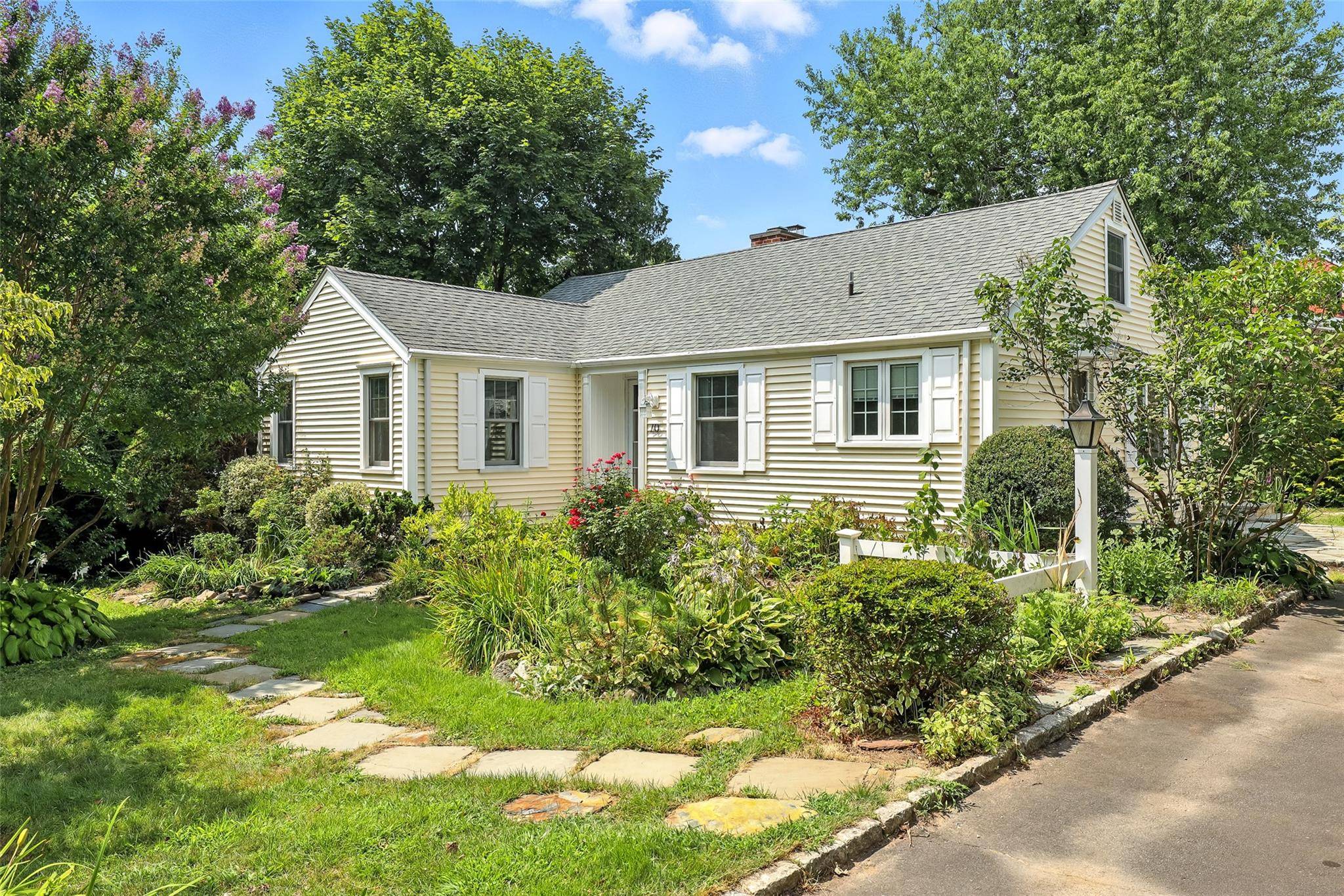Charming One Level Living on a peaceful, tree lined street just a short stroll to the park and train, this delightful ranch offers the ease of one story living in ...