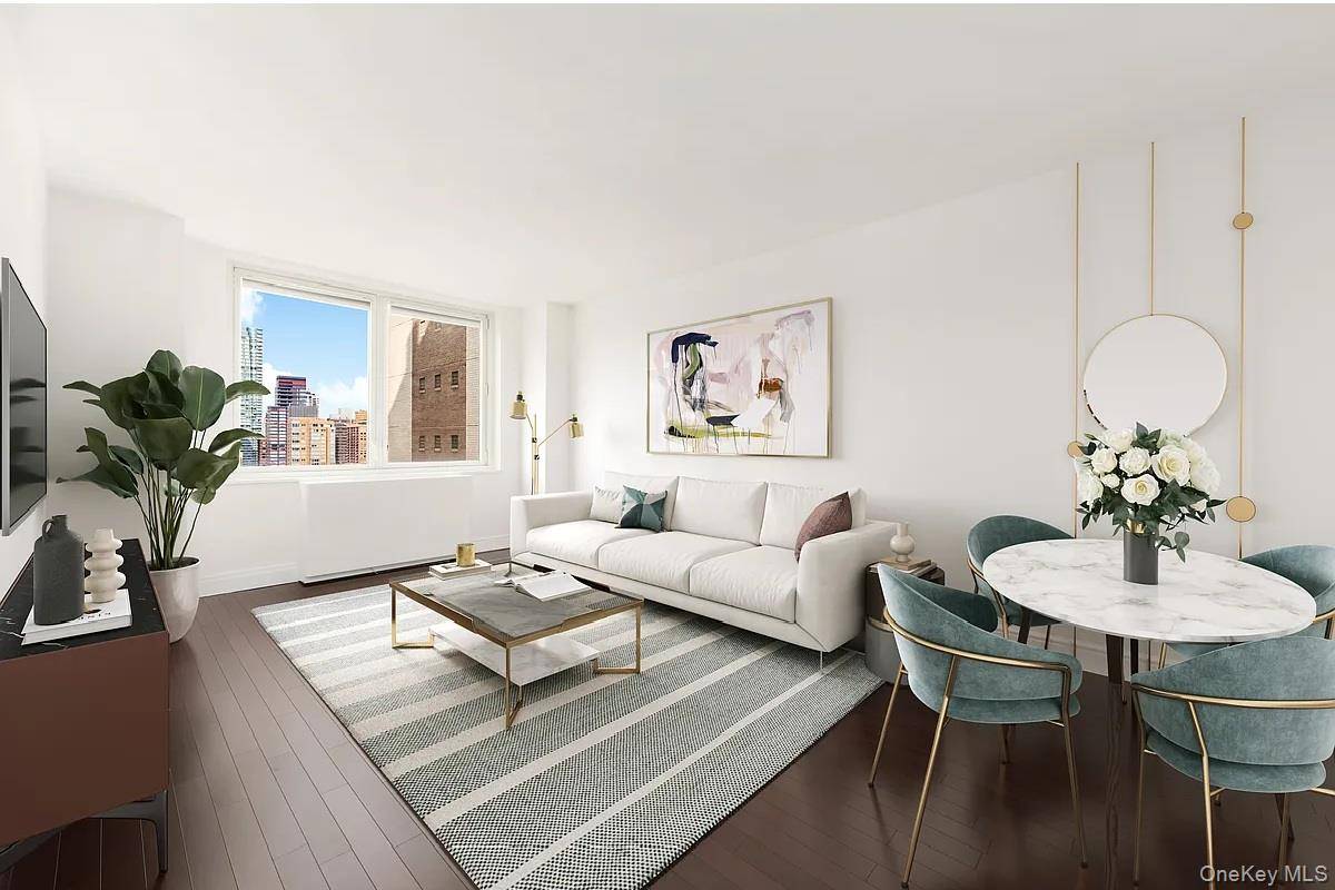 Welcome to Residence 30D at 212 East 47th Street a high floor, light filled home with sweeping city views.