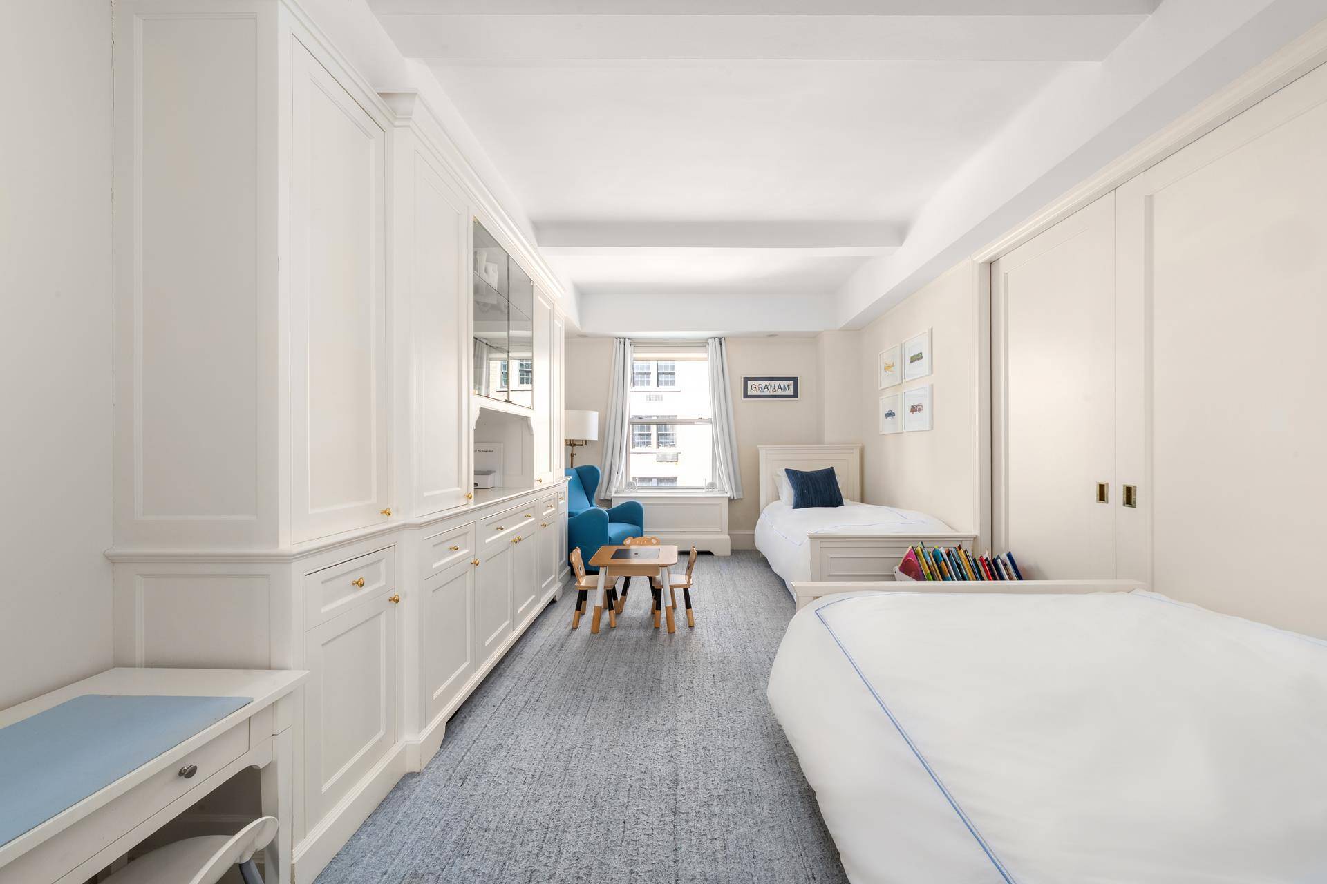 Meticulously renovated classic prewar seven room home, in one of the Upper East Side's premier full service coops buildings.