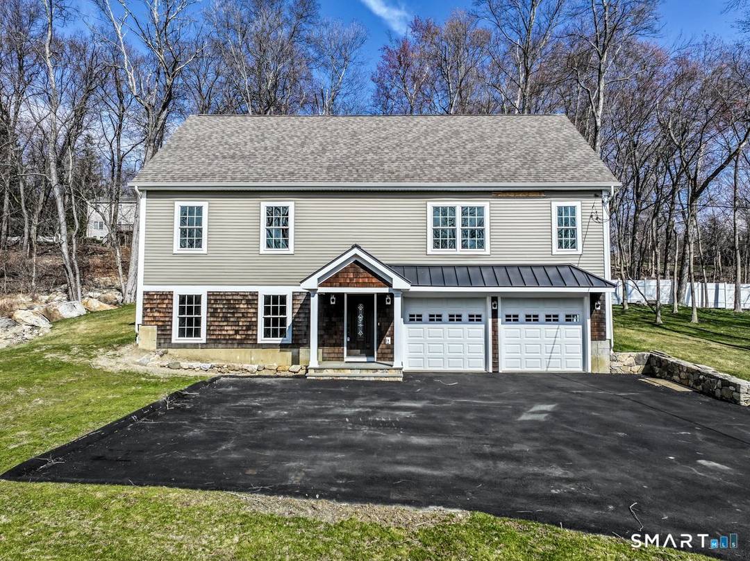 Open and airy new construction in super convenient location with water views.
