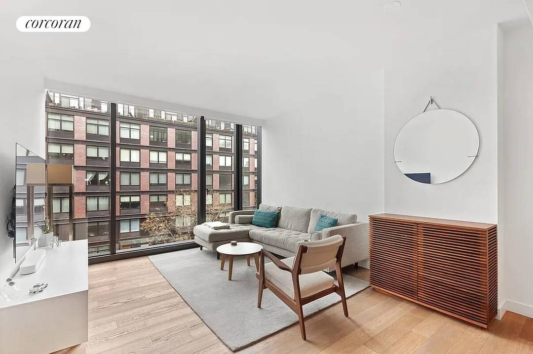 This beautifully designed 1 bedroom, 1 bath residence offers a seamless open layout filled with natural light through expansive floor to ceiling windows.