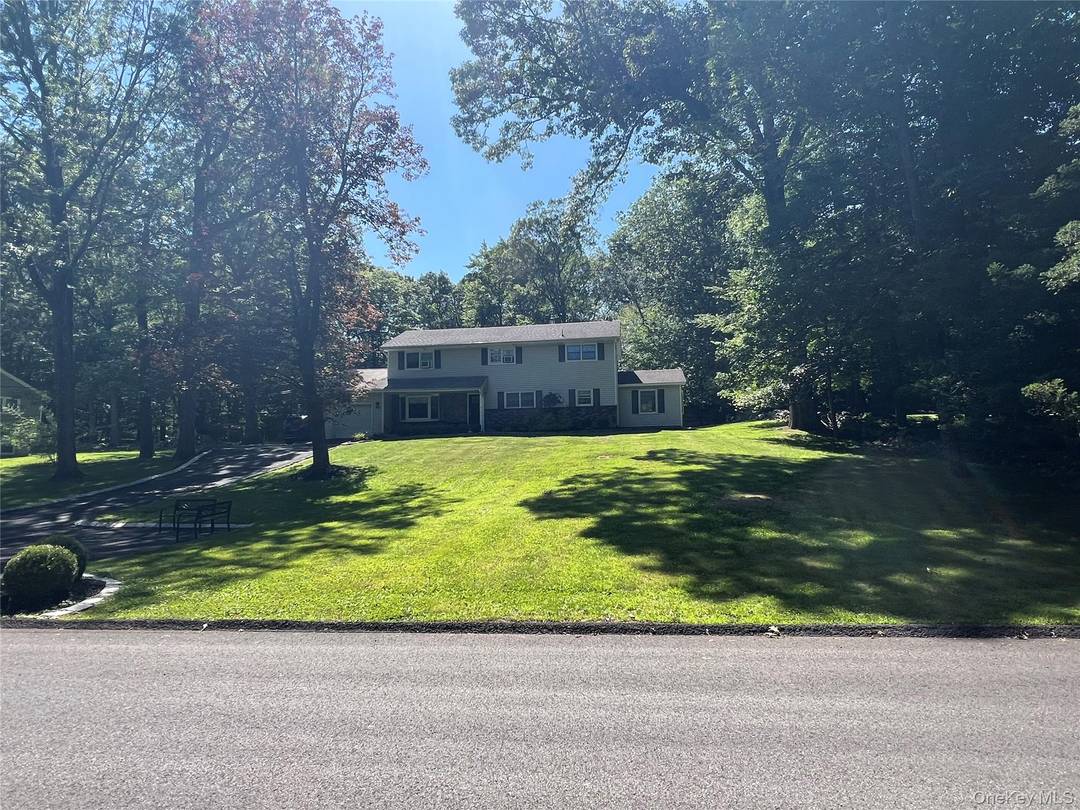 Walk into this immaculate, beautiful home sitting on a huge park like property.