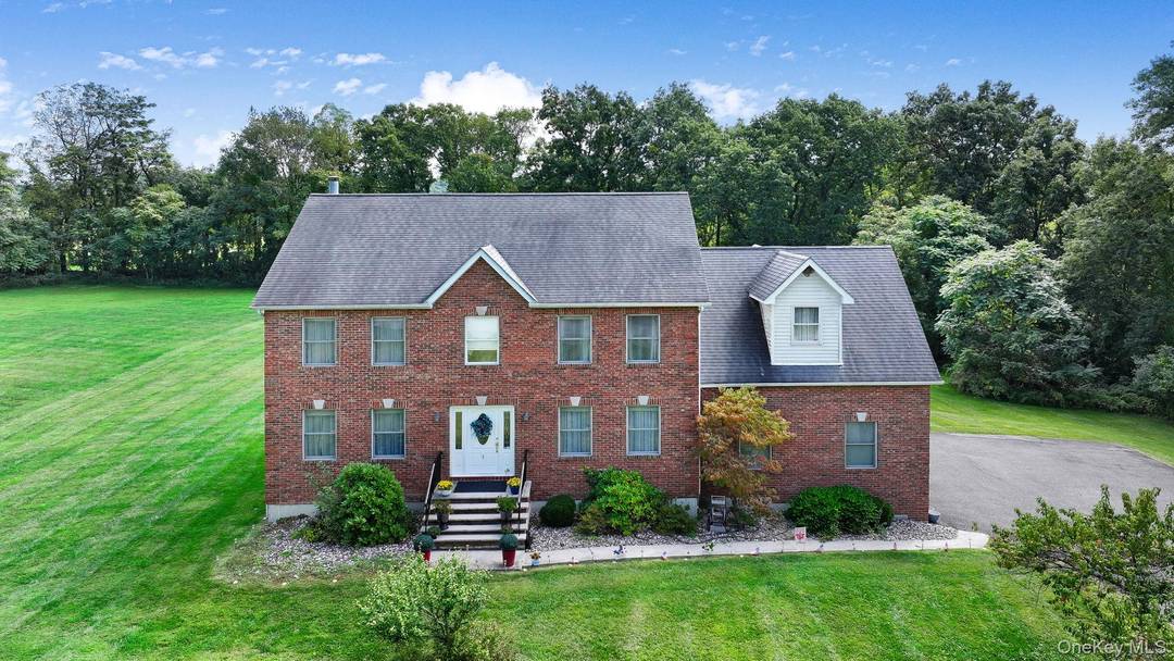 Welcome to this charming Mid Hudson Valley Colonial in Maple Hill, Goshen.