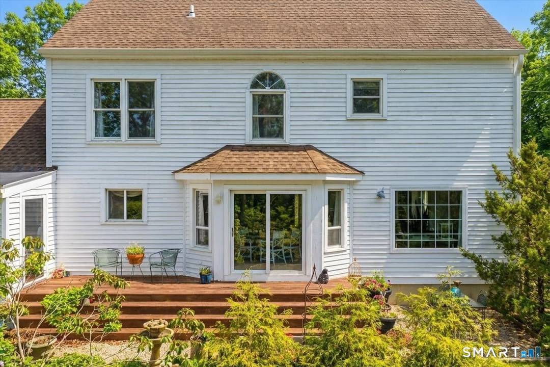 Escape to this serene nearly 6 acre homestead perfectly positioned at the end of a quiet cul de sac bordering a protected land trust preserve.