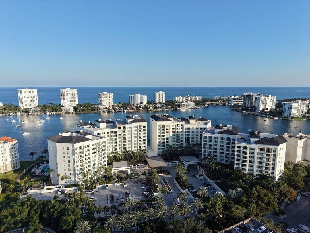 Coveted center stack residence at Mizner Grand with sweeping views of Lake Boca and the Atlantic Ocean, offering exceptional scenery and a recently completed full renovation with refined finishes throughout.