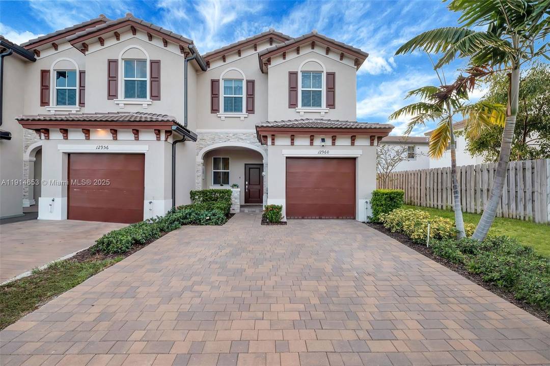 Stunning 2023 corner townhouse located in a prestigious luxury community with 24 7 gated security.