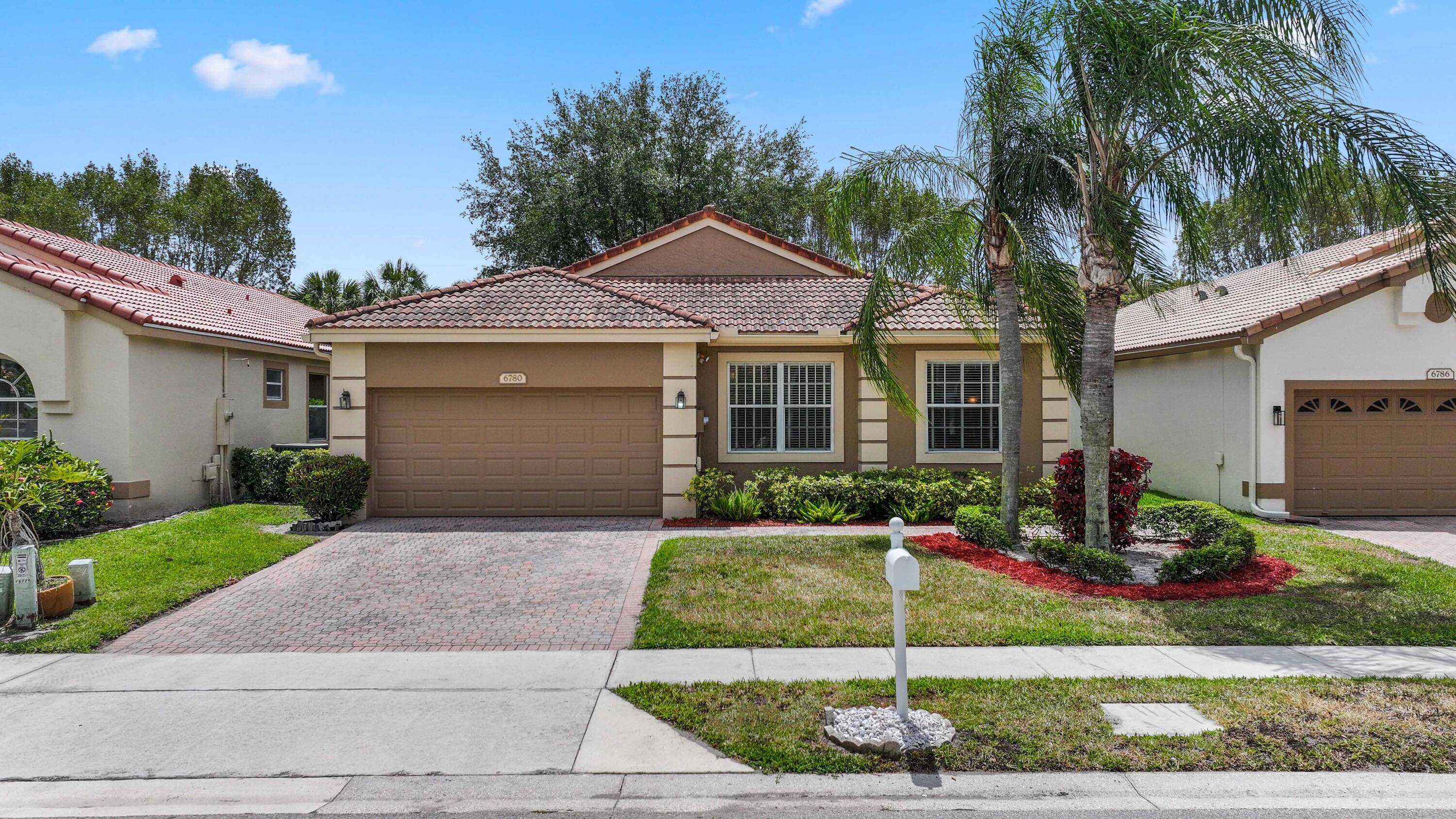 Welcome to 6780 Camille Street in the Lakes of Westchester, a gated, all age community in Boynton Beach.