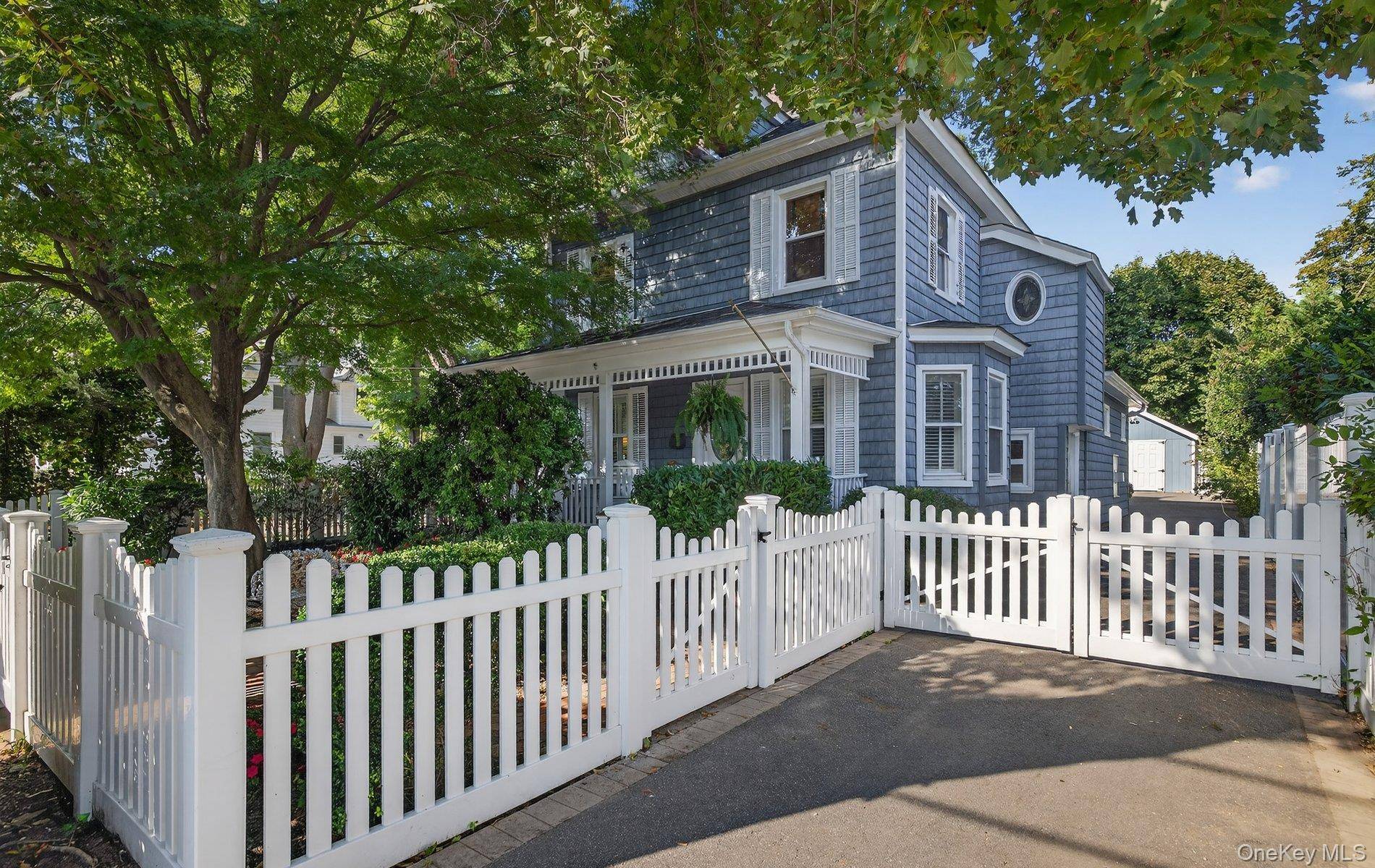 Nestled in the heart of Historic Northport Village, this charming 1907 Colonial offers the perfect blend of classic character and modern convenience.