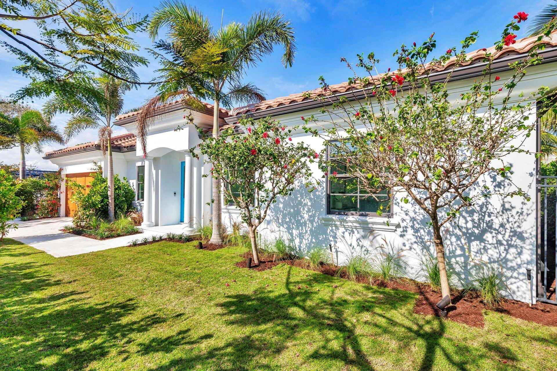 Located one home off South Flagler Drive, stunning serene one story, 4BR 4.