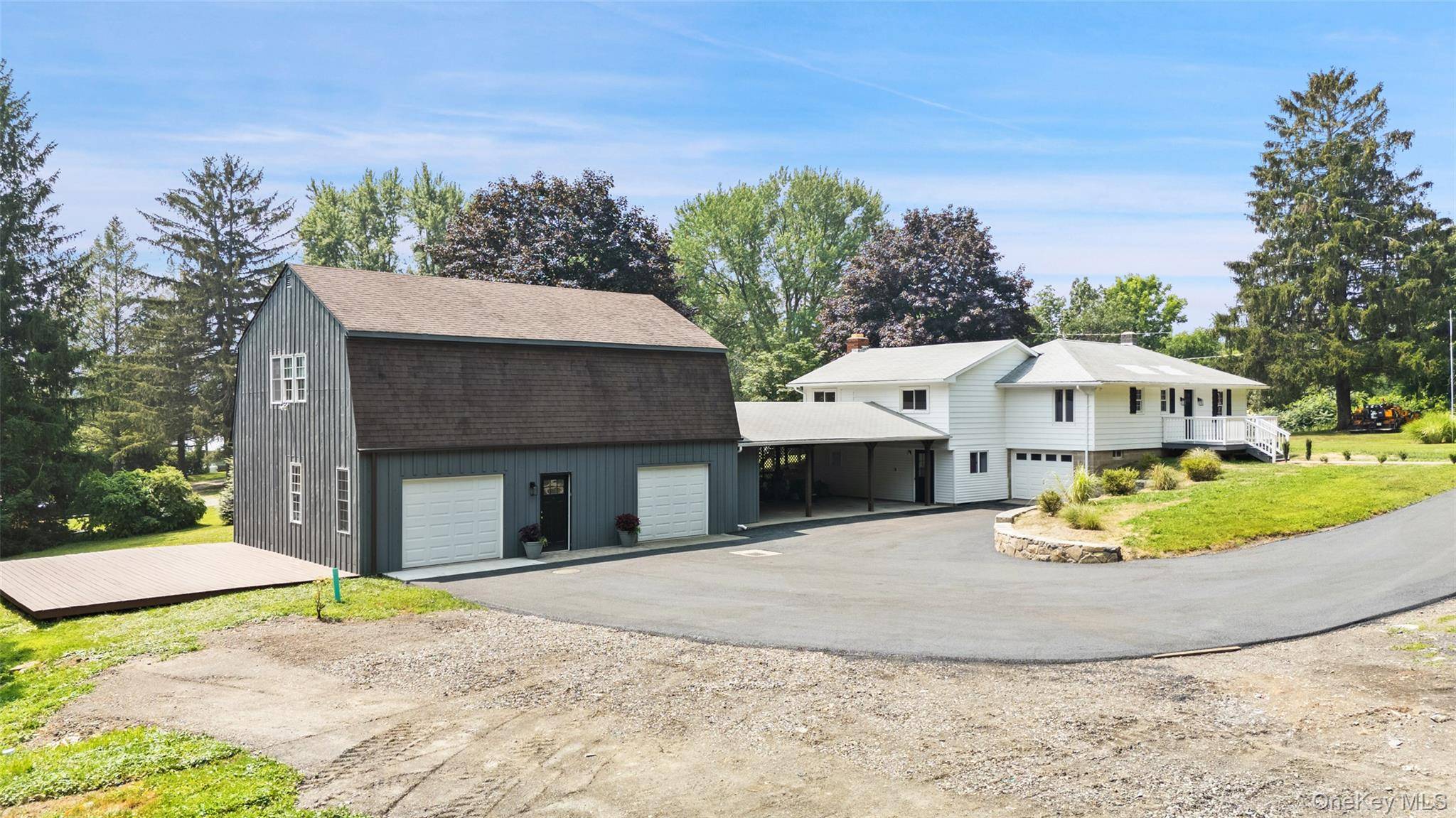 This charming fully remodeled, bright, and sunny ranch featuring 3 bedrooms, 3 full bathrooms, and 2.